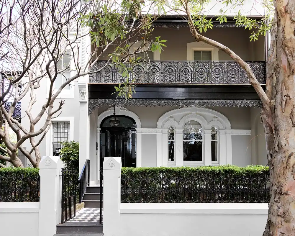 Sydney heritage home exterior featuring detailed iron lacework and new paintwork