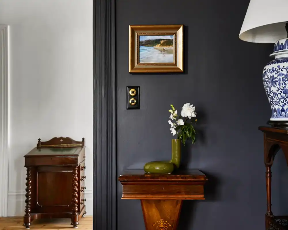 Professional heritage interior painting in Sydney with dark feature wall